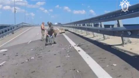 Key Russian bridge to Crimea is attacked again, with Moscow blaming Ukraine for blast that kills 2